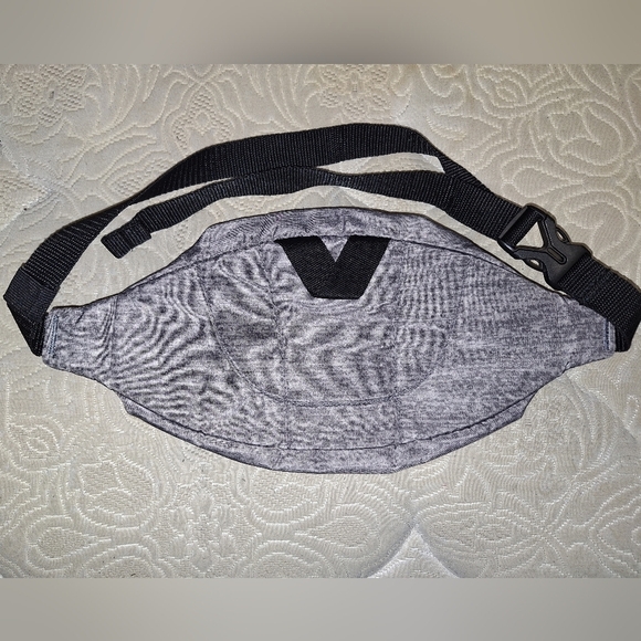 A grey Adidas belt bag. It's in excellent condition. - Picture 2 of 5